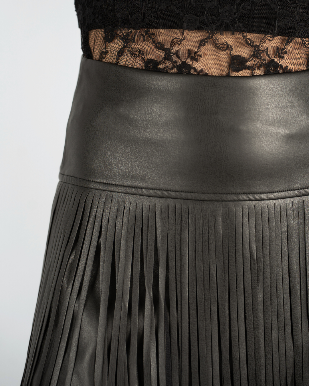 EXTREME WHIPLASH FRINGED FAUX LEATHER SKIRT